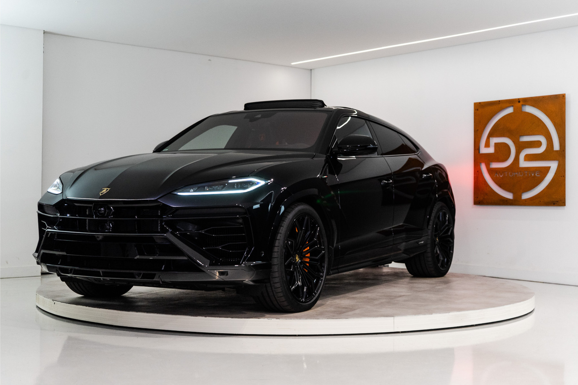 Lamborghini Urus 4.0 V8 Hybrid SE 800PK | Ad Personam | Nero Helene | Nero Ade/Arancio Leoni | Bang&Olufsen 3D | Ceramic | Service Package 5YR | 55971846-0.jpg | D2 Automotive
